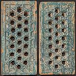 A pair of 18th or 19th century North Indian glazed pottery open worked Jali tiles, 37cm x 18.5cm