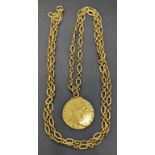 A 1798 George III Guinea gold coin, mounted on an 18ct gold chain, total weight 32g,