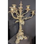 A large Victorian silver centre piece, two tiers of 3 branches, fluted stem with leaf splays, floral