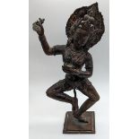A late 19th/early 20th century figure of a dancing Goddess Vajravarahi holding ritual instruments