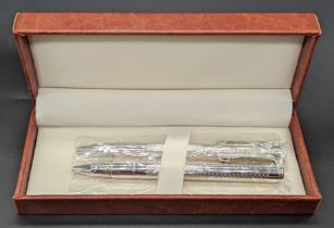 A pair of contemporary silver ball point pens, London hallmarks, cased