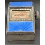 An Aspreys silver and blue guilloche enamel desk telephone index, rotating paper produced by The
