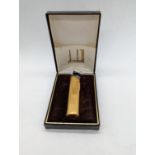 A Dunhill gold plated lighter with case