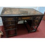 A Hobbs of London oak desk, leather inlay top