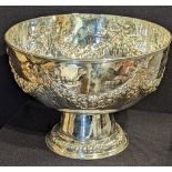A large Duchess of Sutherland Cripples Guild silver Arts and Crafts punch bowl, embossed with