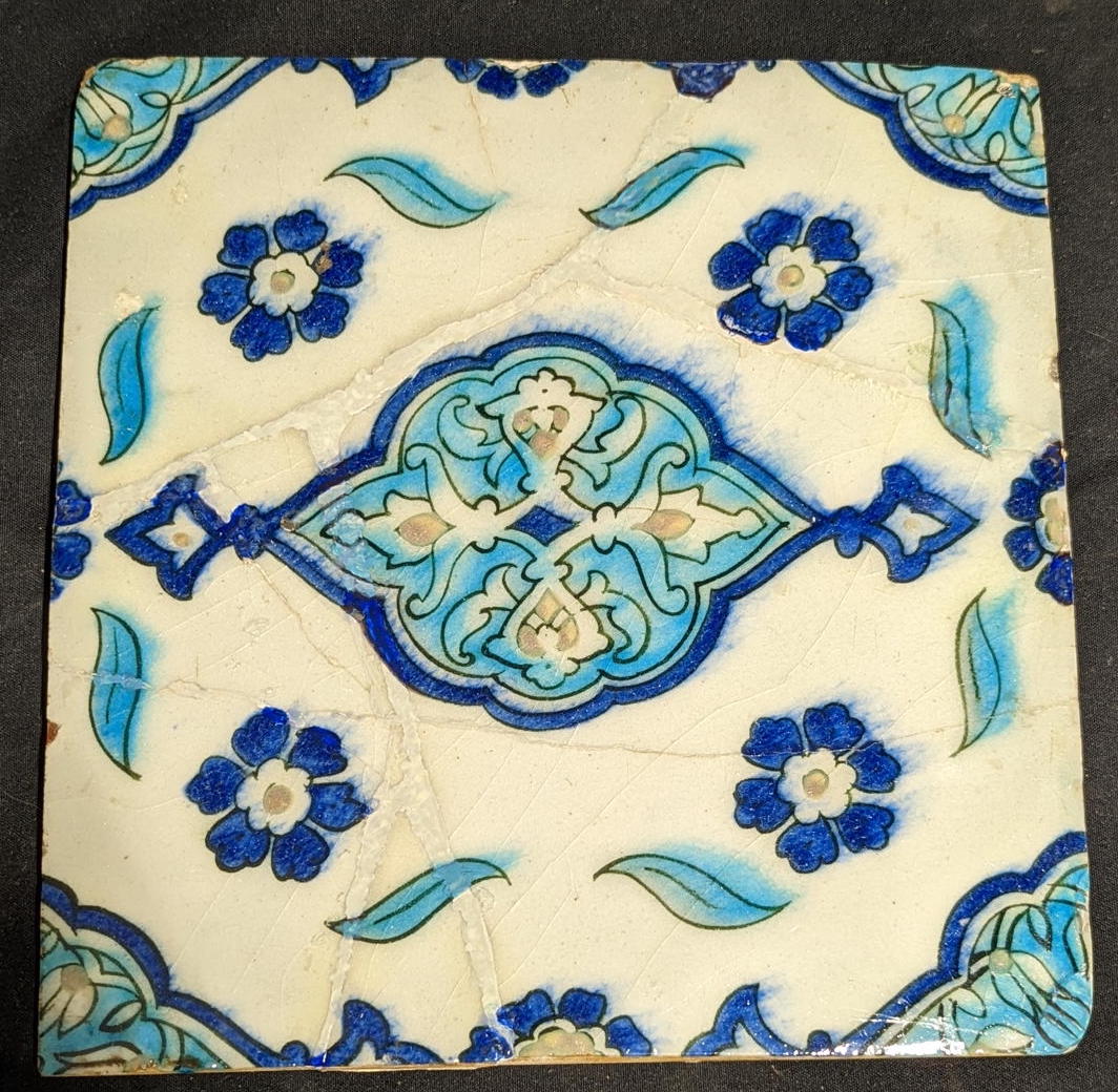 A 17th century Ottoman Iznik tile, 25cm x 24cm