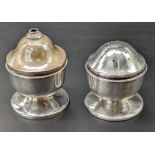 A pair of Liberty & Co silver Arts and Crafts peppers, hallmarked Birmingham, 1928, 83g, H.6.5cm