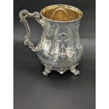 A Victorian Gothic style silver mug, chased decor, hallmarked London, 1847, maker George Ivory,