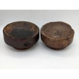 A pair of 18th century carved wooden mortars, D.14cm