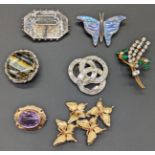 A collection of jewellery to include butterfly brooches, some silver