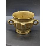 A 14th or 15th century Andalusian Hispano Moresque brass mortar, H.9cm W.15cm