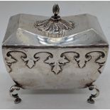 A Walker & Hall silver tea caddy, Gothic style decor, raised on four stepped feet, gilt interior,