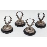 A set of 4 silver stag head place holders, hallmarked Birmingham, 1912, maker H.V.Pithey & Co.