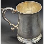 A George II silver tankard by Edward Peacock, hallmarked London, 1735, 358g, H.11cm