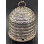 A George III silver honey skep, bee hive form with removable lid, raised on 3 cylindrical legs, Lion