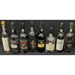 A collection of vintage port to include Calem 40 year old, Burmester Colheita 1985, Quinta do