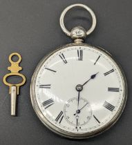 A large 19th century silver pocket watch, sunken subsidiary dial, Roman numerals, outer track,