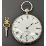 A large 19th century silver pocket watch, sunken subsidiary dial, Roman numerals, outer track,