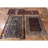 2 Afghan rugs together with two camel sacks