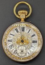 An 18ct gold skeleton pocket watch, silvered dial elaborately decorated with gilt embellishments