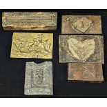 A collection of 19th century ceiling molds, other molds, an 18th century lead plaque and a brass