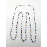 An Edwardian multi-colour gemstone sapphire long chain necklace, sapphire