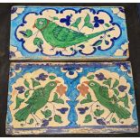Two rare 19th century Indian Multan tiles depicting green parrots, 30.5cm x 18cm and 30.5cm x 15.