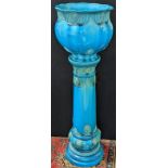 A Burmantofts turquoise/blue faience jardiniere H.120cm