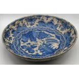 A fine 17th century Persian Safavid glazed pottery blue & white dish, D.29cm