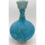 A fine large 13th century Persian kashan turquoise glazed surahi bottle, H.26cm