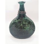 A 17-18th century Safavid Persian green glass saddle flask, H.25cm