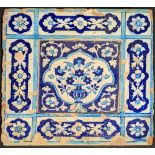 A fine large 18th century Mughal multan tile depicting floral decoration, 38cm x 38cm x 3cm