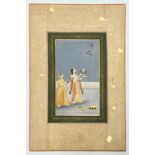 A fine 19th century Indian miniature painting depicting two ladies on a terrace with birds, gouache,