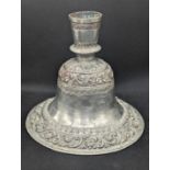 A 19th century Indian silver hookah base, Lucknow, bell shaped body and truncated neck, bands of