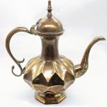 A 19th century Indian Mughal brass ewer, unusual faceted body, H.26cm