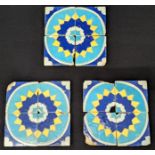 A collection of twelve 19th century Persian or Central Asian geometric Cuerda Seca tiles, each