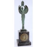 Georges Contaux (French, 1891-1984), an Art Deco bronze sculpture of an angel holding a flame,