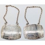 A pair of Sherry and Port decanter labels in the form of barrels, hallmarked Sheffield, 2000,46g,