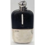 A large silver and leather hip flask, hallmarked Sheffield, 1911, maker James Dixon & Sons Ltd, H.
