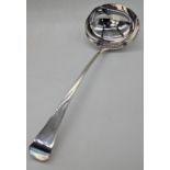 A George III soup ladle, hallmarked London, 1808, maker Thomas Dicks, 170g, L.40cm