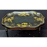 A Jennens & Bettridge Victorian papier mache tray on faux bamboo stand, x-stretcher with gold