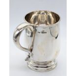 An early 20th century silver beer tankard, hallmarked Birmingham, 1936, maker Atkins Bros, 310g, H.