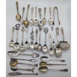 A collection of silver teaspoons, mostly British marks, approx 400g