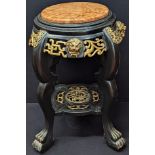 A Chinese black lacquer jardiniere, marble top, brass appliques, paw feet, H.75cm (A/F)