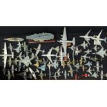 A large collection of model airplanes and aircraft carriers