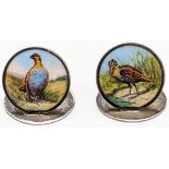 A pair of silver and enamel bird menu holders depicting a grouse and woodcock, marks to base,