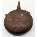 An 18th-19th century Ottoman or Persian leather water flask, H.23cm