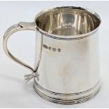 A 20th century silver small mug, hallmarked Sheffield, 1972, maker R&B, 140g, H.18cm