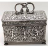 A Continental silver caddy box with repousse embossed decor of cherubs, 365g, H.9cm L.13cm D.7cm