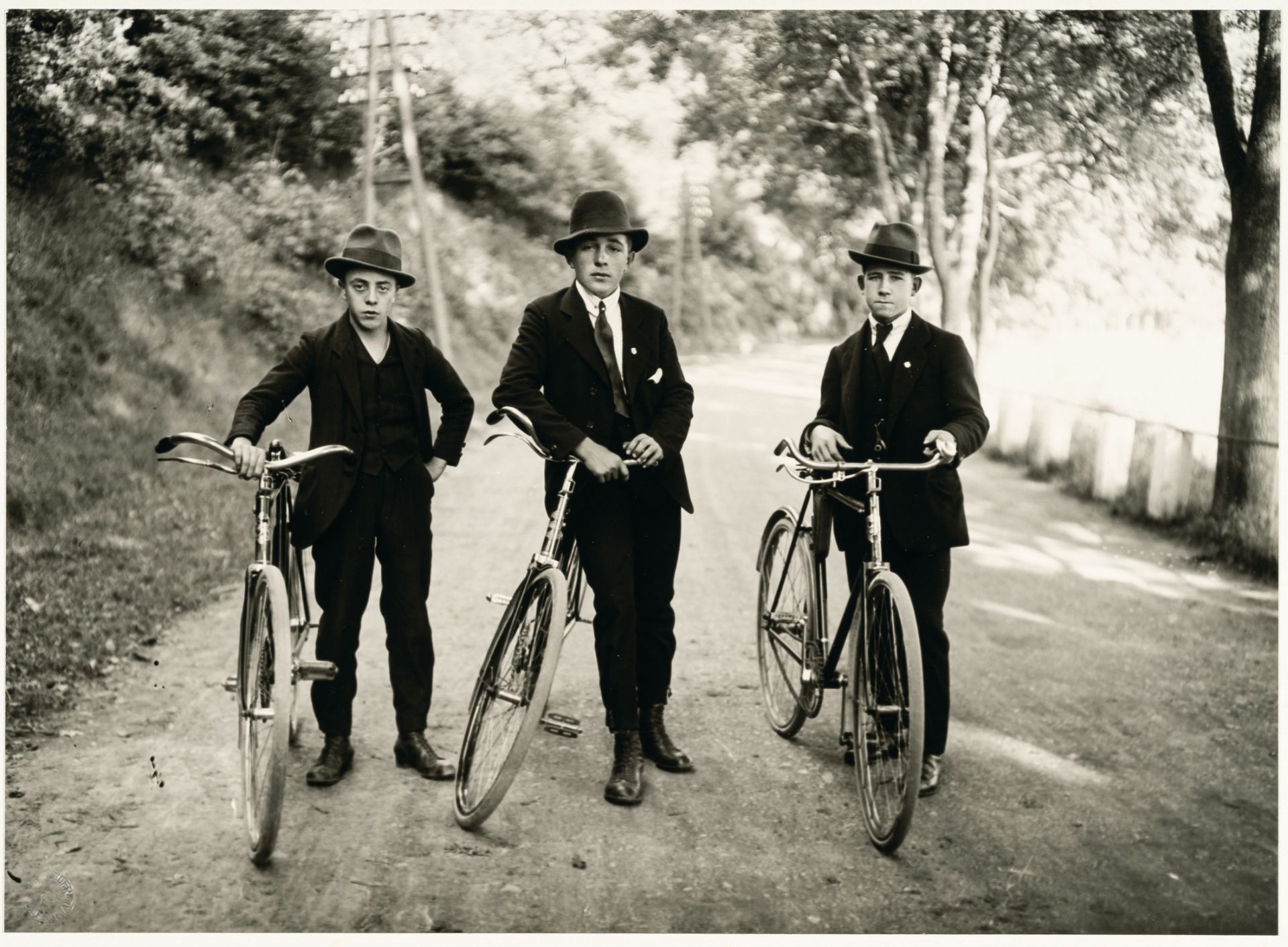 August Sander, Three young farmers with bicycles.Vintage gelatin silver print on photo paper. ( - Image 2 of 3